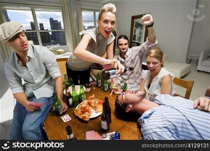 Young woman with her friends enjoying a party