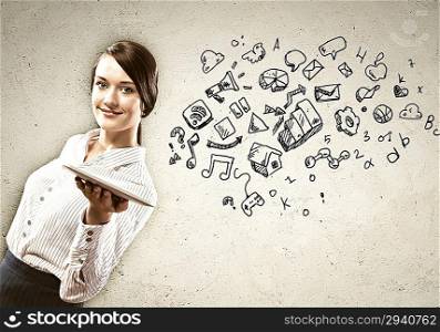 Young woman with ipad in hands