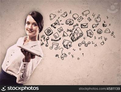 Young woman with ipad in hands. Image of young woman holding in hands ipad