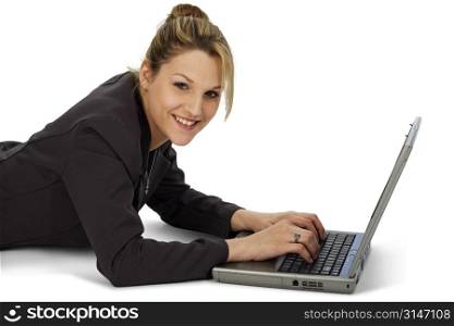 Young woman with laptop over white.