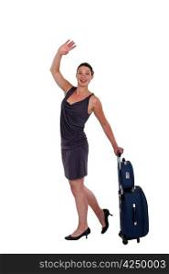 young woman with luggage waving goodbye