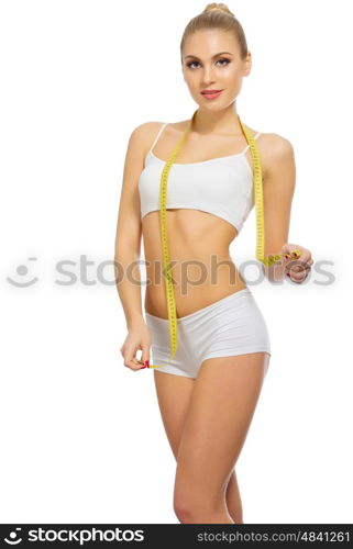 Young woman with measurement tape isolated