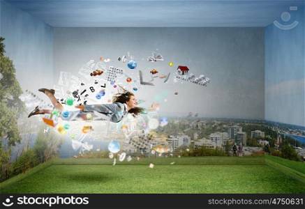 Young woman with megaphone flying in sky and announcing something