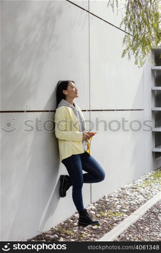 young woman with mobile outdoor 2
