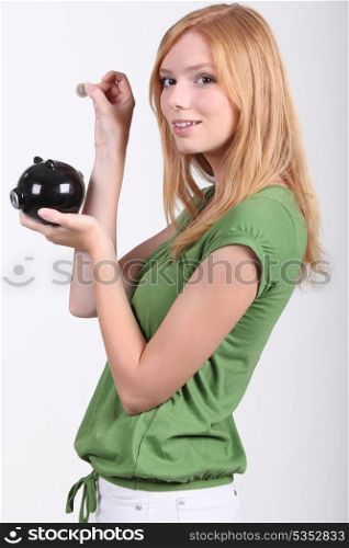 young woman with money box