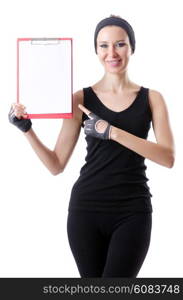 Young woman with notepad writing on white