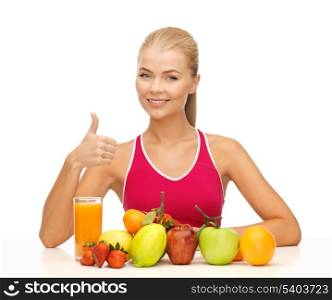 young woman with organic food or fruits showing thumbs up