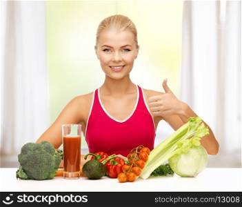 young woman with organic food showing thumbs up