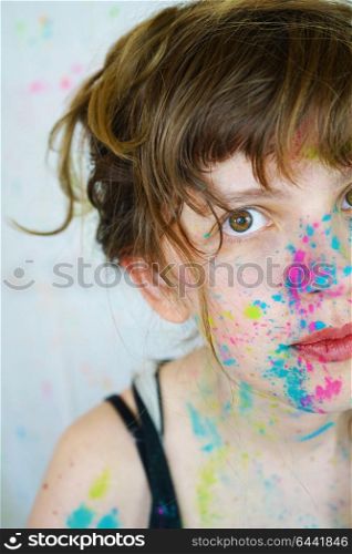 Young woman with paint in her face