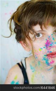 Young woman with paint in her face