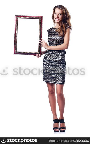 Young woman with picture frame on white