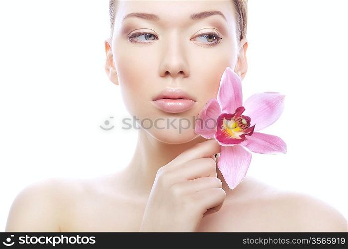 young woman with pink flower on white background