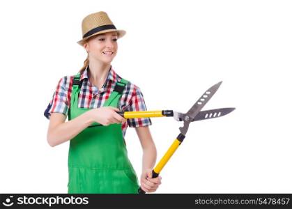 Young woman with shears on white