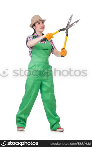 Young woman with shears on white