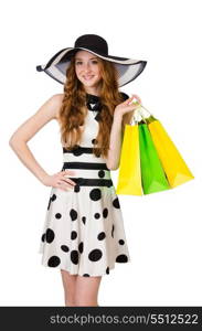 Young woman with shopping bags on white