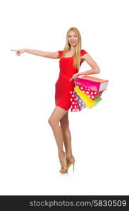 Young woman with shopping bags on white