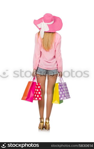 Young woman with shopping bags on white