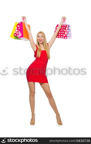 Young woman with shopping bags on white