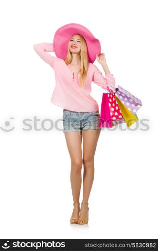 Young woman with shopping bags on white