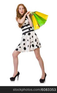 Young woman with shopping bags on white