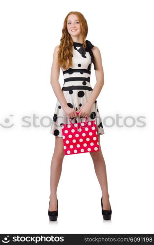 Young woman with shopping bags on white