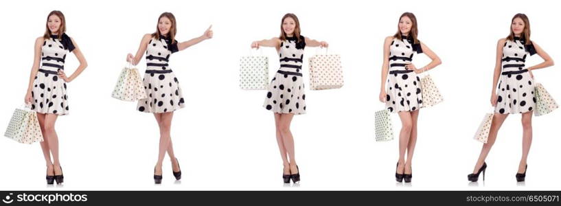 Young woman with shopping bags on white