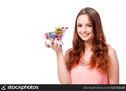 Young woman with shopping cart isolated on white