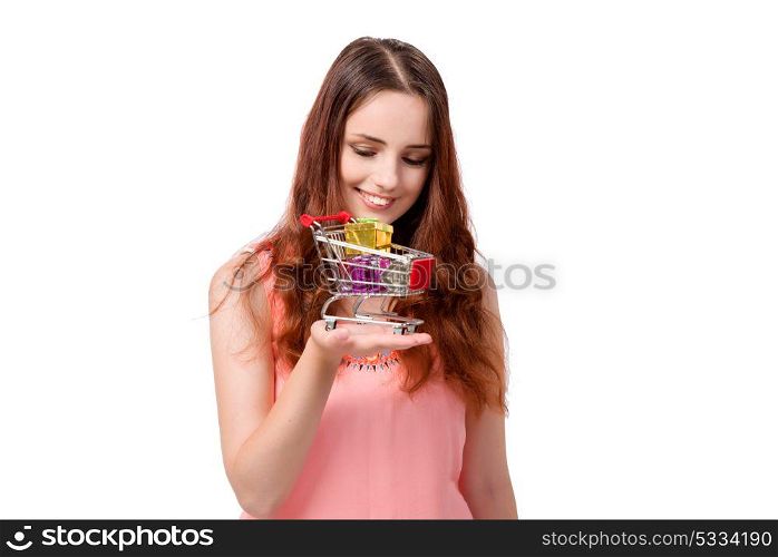 Young woman with shopping cart isolated on white