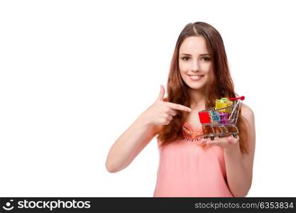 Young woman with shopping cart isolated on white