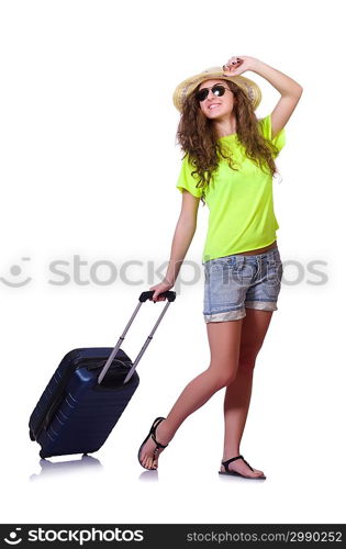 Young woman with suitcase on white