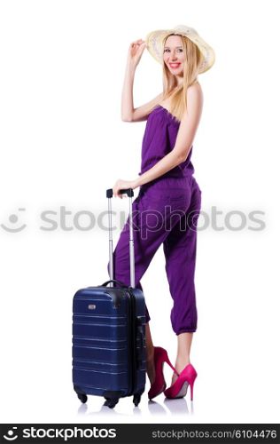 Young woman with suitcase on white