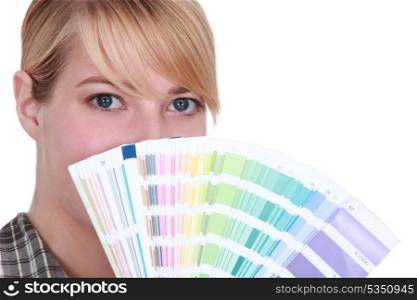 Young woman with swatches