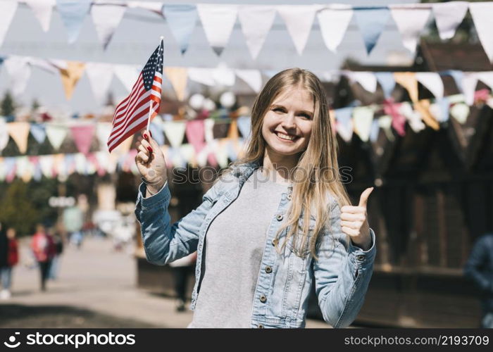 young woman with usa flag festival