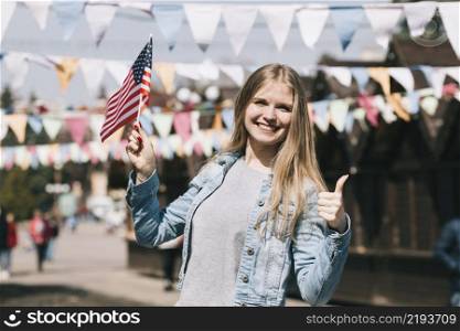 young woman with usa flag festival