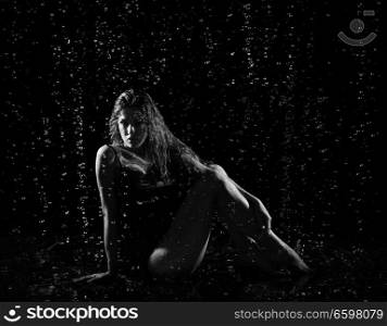 Young woman with water drops (monochrome ver)
