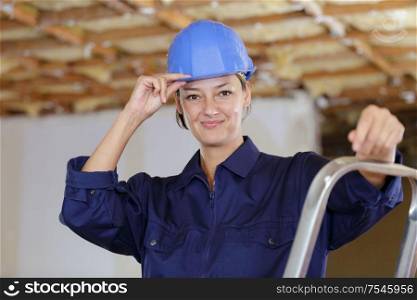 young woman worker on the building site