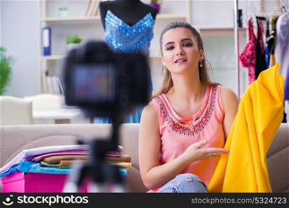 Young woman working as fashion blogger vlogger