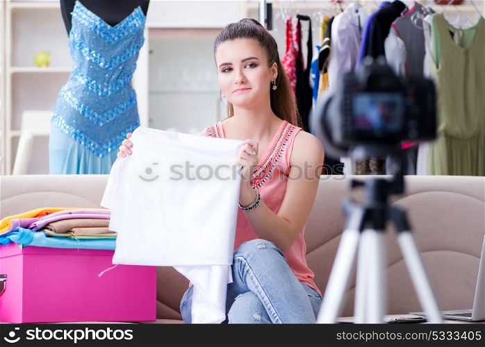 Young woman working as fashion blogger vlogger