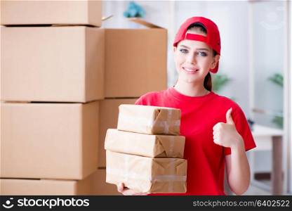 Young woman working in parcel distribution center