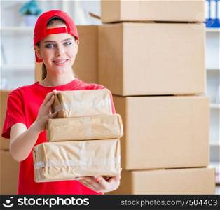 Young woman working in parcel distribution center. The young woman working in parcel distribution center