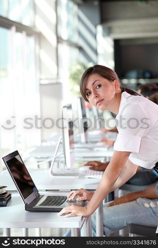 Young woman working in the office