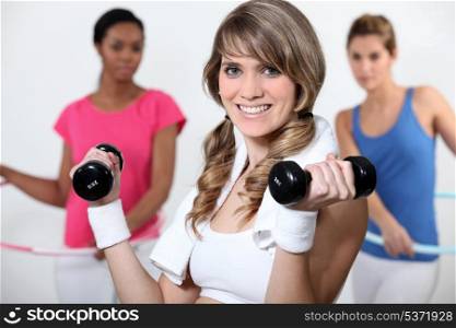 Young woman working out at the gym
