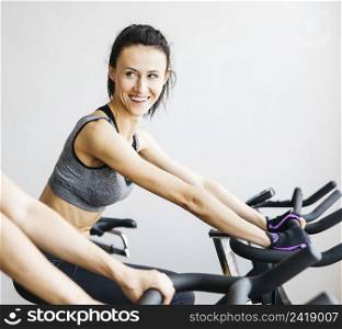 young woman working out gym