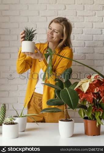 young woman yellow shirt gardening home 2