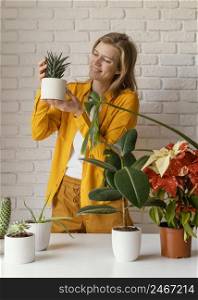 young woman yellow shirt gardening home 2