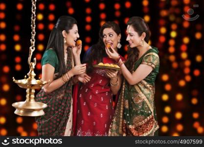 Young women celebrating Diwali
