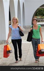 Young women doing shopping
