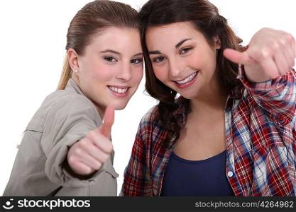 Young women giving the thumb&acute;s up
