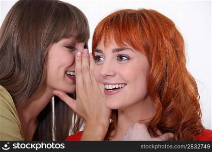 young women gossiping
