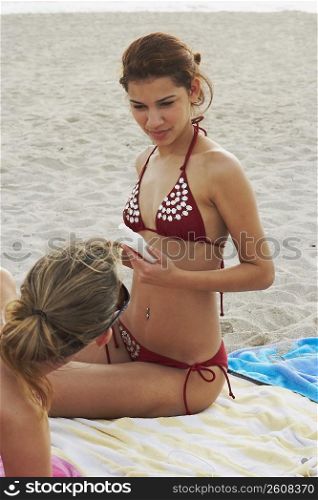 Young women hanging out at beach